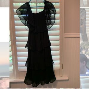 ruffled black prom dress, worn once, can be off the shoulder or on, size small